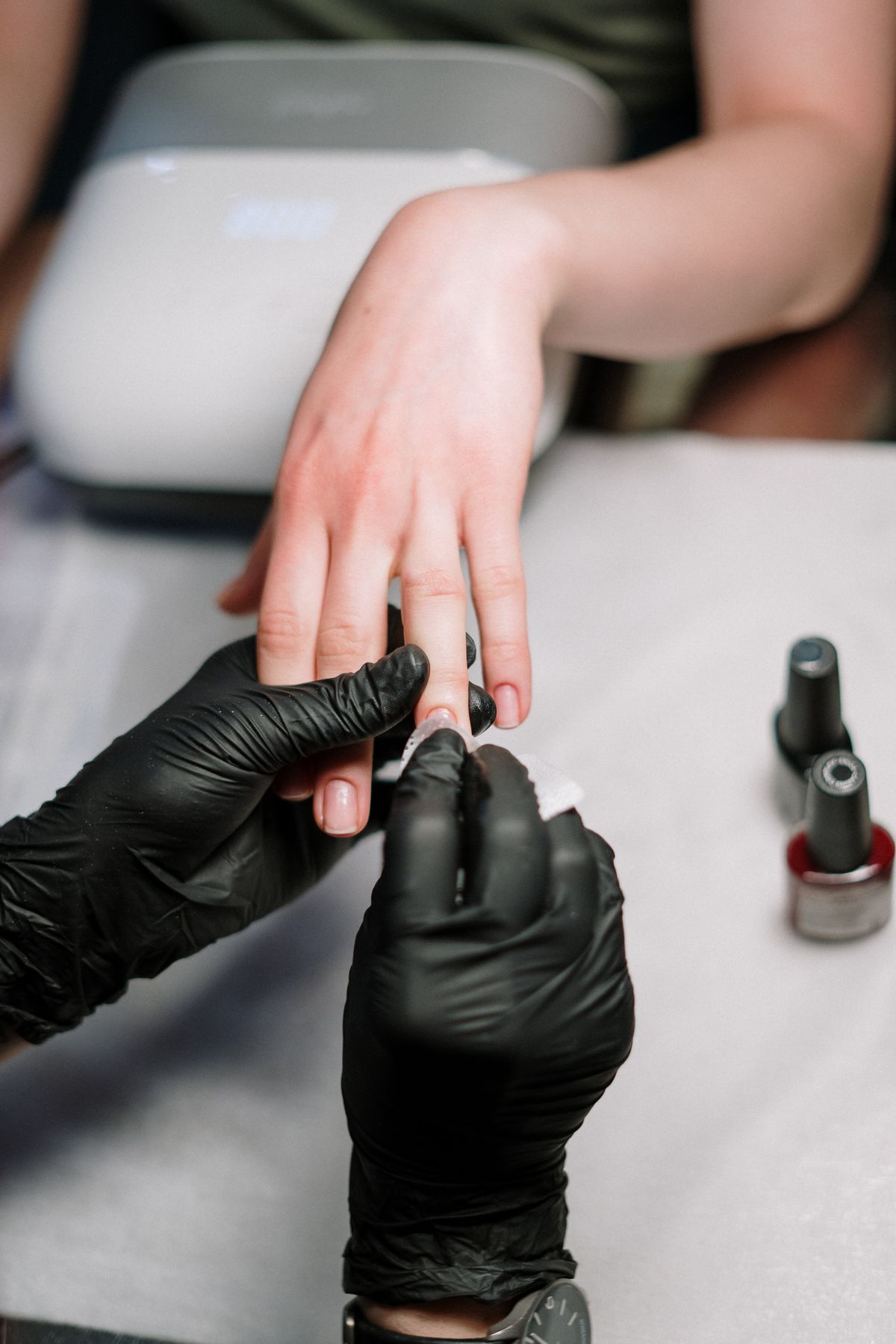 Manicure treatment in progress at Signature Nails & Spa