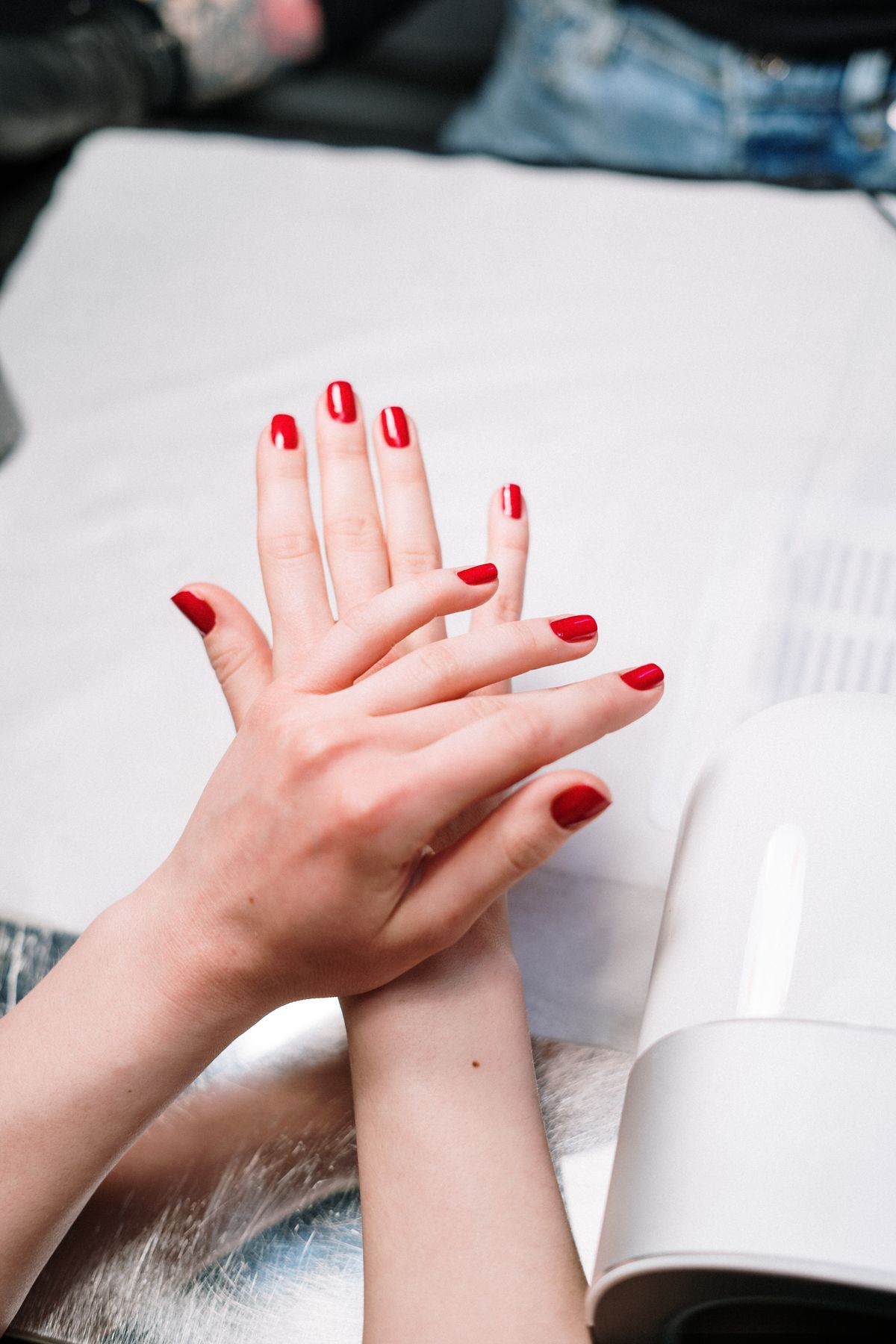 Red gel manicure set at Signature Nails & Spa